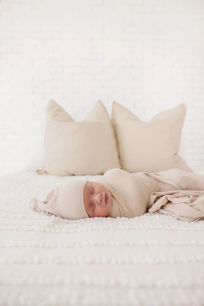 The Coved Ribbed Swaddle Blanket